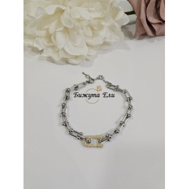 Дамска гривна от стомана със златист акцент